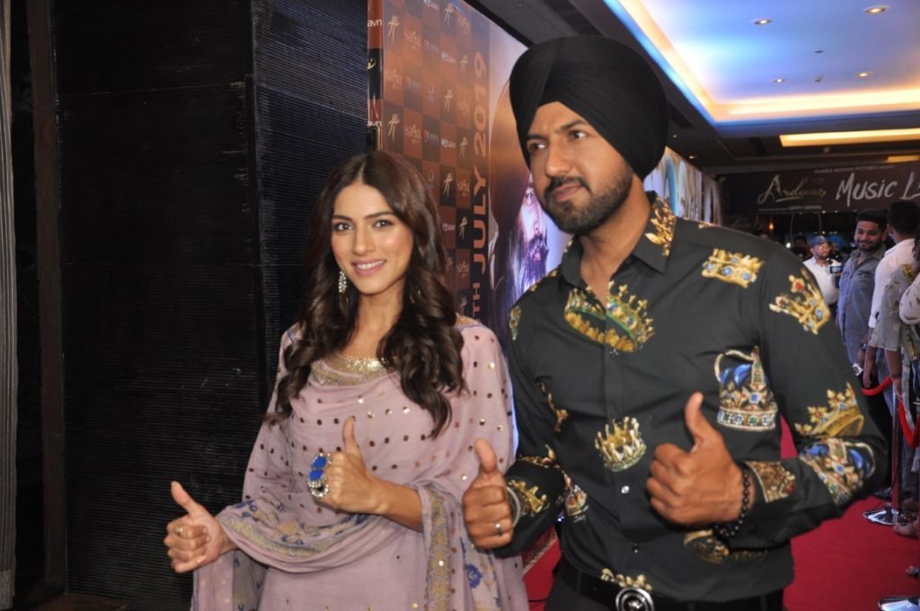 L R Sapna Pabbi Gippy Grewal pose at the music launch of Ardaas Karaan