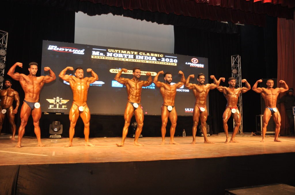 Bodybuilders showcasing their well built muscles and physique during Ultimate Classic Mr. North India Body Building & Physique Championship 2020 